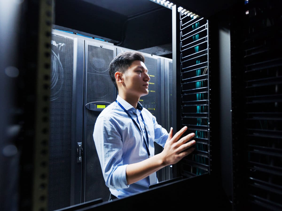 Engineer reviewing a data center deployment